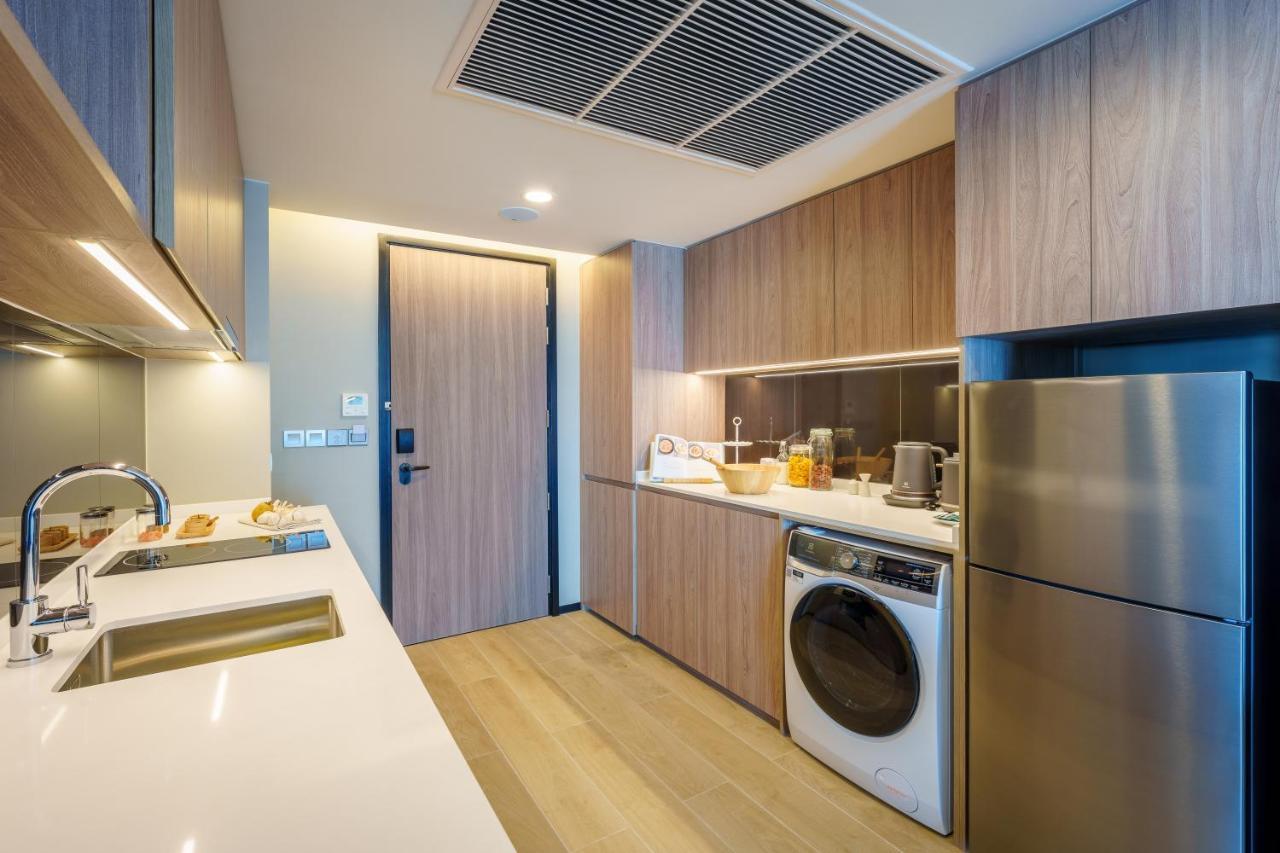 Somerset 파타야 외부 사진 A kitchen in a 3-bedroom unit